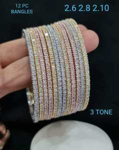 Premium Designer Star Cut American Diamond 12 Brazaletes Set Brazaletes de lujo Perfecto para ropa de fiesta - Product Image 3