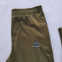 Alta calidad 100% poliéster hombres entrenamiento Jogging desgaste secado rápido transpirable patrón sólido 2 piezas chaqueta pantalón conjunto chándales