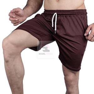 Pantalones cortos atléticos para hombre con cintura elástica Pantalones cortos de estilo casual de patrón sólido transpirable con bolsillos - Product Image 2