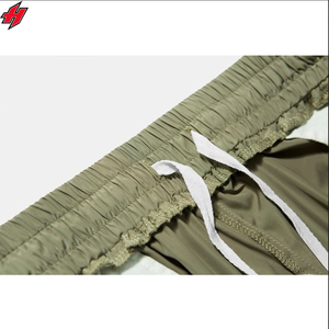 Pantalones de chándal de nailon personalizados 100% poliéster pantalones de nailon de pierna ancha logotipo bordado 3D pantalones de chándal de nailon holgados para hombres - Product Image 2