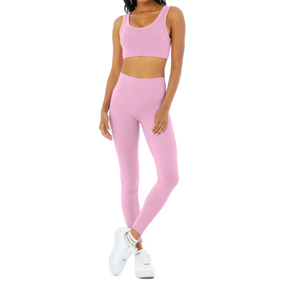 Solid color seamless Supportive Active wear high impact strap bra and long flare leggings suit wholesale best design fashion