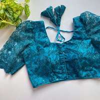 Blouse prête-à-porter en tulle, entièrement brodée et ornée de travail manuel, pour occasions spéciales.