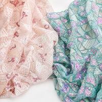 Tissu en dentelle à sequins brodés géométriques en gros, textile transparent de luxe pour robes de scène, décoration de mariages et événements, vêtements