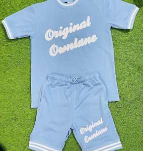 Conjunto de pantalones cortos cortavientos unisex personalizados al por mayor para hombre, chándales transpirables cortos de nailon de color hechos a medida para hombre - Product Image 3