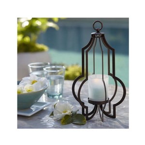 Ensemble de bougeoirs en métal bohème chic avec de fines incrustations, parfait pour la décoration de la table, du salon, de la chambre ou des événements spéciaux - Product Image 4