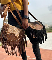 Nouveaux cheveux élégants sur peau daim fourrure cuir frange sac à bandoulière femmes parfait à la mode vente chaude en forme de baril sacs à bandoulière