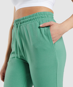 Venta al por mayor personalizado Casual Hip Hop estilo Logo cómodo algodón Harem Cargo Jogger pantalones multicolor pantalones de chándal mujeres OEM mantenido - Product Image 4