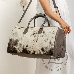 กระเป๋าเดินทางหนังวัวสำหรับผู้ชายและผู้หญิง - Product Image 3
