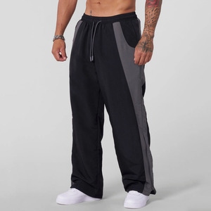 Precio de fábrica, pantalones holgados de gran tamaño personalizados, pantalones para correr, ropa informal, pantalones de chándal con tira lateral, pantalones de chándal de alta calidad para hombres - Product Image 1