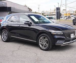 Genesis GV70 2.5T AWD 2024 Noir Intégral d'occasion, Toit ouvrant gauche, Démarrage à distance, Sièges en cuir, Pack Premium, Boîte automatique, Jantes en alliage - Product Image 1