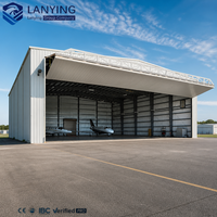 Hangar d'avion préfabriqué en acier à grande portée, structure d'entrepôt moderne à façade ouverte