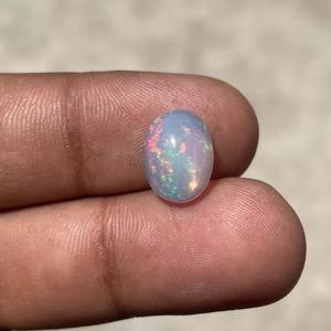 Cabujón de corte ovalado de ópalo etíope sintético tratado térmicamente ópalo arcoíris de fuego múltiple para fabricación de joyas blanco suelto para colgante de anillo - Product Image 3