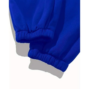 Chándal Personalizado con Pedrería para Hombre y Mujer con Logotipo Personalizado en la Parte Delantera y Trasera, Pedrería en los Brazos y Pantalones - Product Image 4