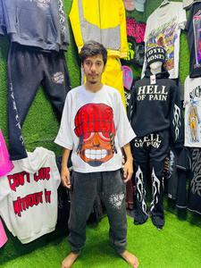 เสื้อยืดผ้าฝ้ายโอเวอร์ไซส์โลโก้ด้านหน้าและด้านหลังพิมพ์ลายผู้ผลิตเสื้อผ้าชั้นนำสำหรับอุตสาหกรรมสีแทนซี่ราคาถูก