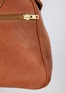 Bolsa de viaje de cuero suave de primera calidad con cierre de cremallera Cómoda y conveniente para aventuras en movimiento - Product Image 4