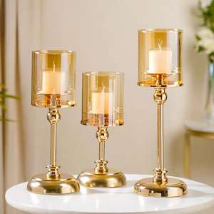 Support de bougie en métal de style antique en gros avec finition dorée pour la décoration de la maison de luxe, l'hôtellerie et la décoration d'événements - Product Image 1