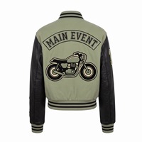 Blouson universitaire femme court en laine vert sauge et noir avec manches en cuir, patch moto en chenille personnalisé