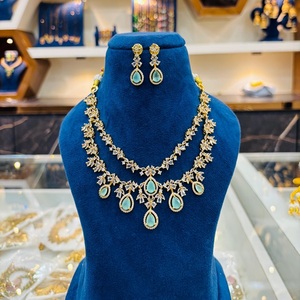 Conjunto de collar de diamantes de circón de doble capa de diseñador con pendientes conjunto de collar con acabado dorado CZ diamante para boda para mujer - Product Image 1