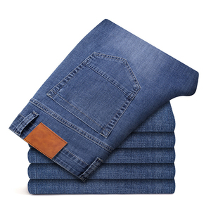 Jeans en denim taille moyenne pour hommes, style rétro personnalisé, pantalon délavé de couleur unie, méthode de tissage en tricot avec boutons pour toutes les saisons - Product Image 1