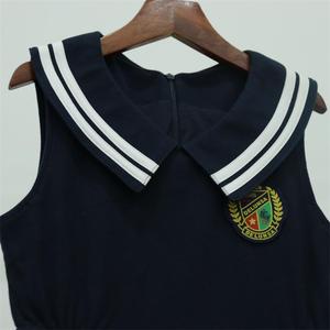 Uniforme Escolar Personalizado OEM para Niñas de Secundaria, Vestido de Verano de una Pieza con Falda y Cuello Peter Pan para Adultos, 100% Algodón - Product Image 5