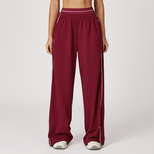 Pantalones acampanados atléticos de ajuste holgado para mujer con bolsillos de cierre de cintura elástica - Product Image 1