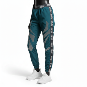 Pantalon coupe-vent pour femme, tissu en nylon tissé de qualité supérieure, couleur sarcelle, design de panneau latéral, logo jacquard personnalisé, pantalon coupe-vent - Product Image 4