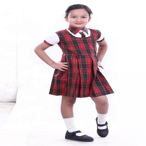 Vente en gros d'uniformes scolaires pour filles de haute qualité avec logo personnalisé T-shirt et salopette d'été en coton pour enfants - Product Image 2