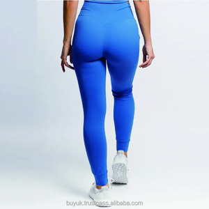 Pantalon de yoga en forme de V pour femmes de qualité supérieure Leggings personnalisés en tissu tricoté solide à taille haute avec deux poches latérales - Product Image 5