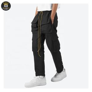 กางเกงคาร์โก้ผู้ชายทรงสตรีทแวร์ ดีไซน์ใหม่ล่าสุดปี 2025 ระบายอากาศได้ดี มีเชือกผูกและกระดุม กันน้ำ เป็นมิตรกับสิ่งแวดล้อม ขายดีจากโรงงาน - Product Image 3