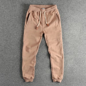 Terry Cloth Pantalones de chándal de color sólido para hombre Simple lavado Cordón Casual Deportes Juventud Pantalones atados al tobillo - Product Image 1