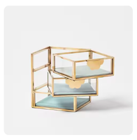 Boîte à bijoux contemporaine en verre clair et laiton avec cadre en métal décoratif de luxe