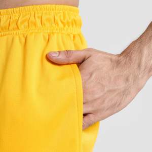 Shorts 100% Polyester jaunes taille XS, confortables, à taille élastique, avec impression par sublimation, pour vêtements de sport ou de loisirs, avec logo. - Product Image 6