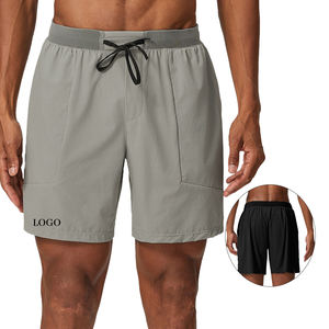 กางเกงขาสั้นกีฬาผู้ชายแบบ 2 in 1 พรีเมียม น้ำหนักเบา สำหรับฤดูร้อน ผลิตจากไนลอนผสมสแปนเด็กซ์ เอวกลาง สไตล์ลำลอง สีพื้น เหมาะสำหรับวิ่ง - Product Image 1