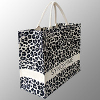 Bolsas de lona gruesas, bolsa de compras de estilo de vida elegante y elegante con estampado de leopardo bajo su marca, bolsas de promoción de lona con estampado de leopardo