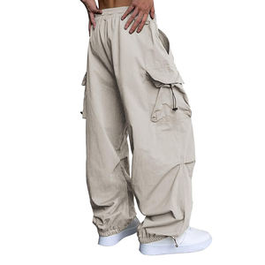 Vêtements de ski de neige personnalisés pour hommes Pantalon de survêtement en polyester coupe-vent de haute qualité Couleurs unies Coupe ample Baggy oversize à fermeture éclair fond ouvert - Product Image 4