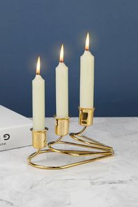 เชิงเทียนโลหะสีทองหรูหรา 4 แขน สำหรับตกแต่งโต๊ะงานแต่งงาน ของตกแต่งบ้าน ของขวัญวันอีด สไตล์มินิมอล รูปทรงเรขาคณิต งานศิลปะ - Product Image 3