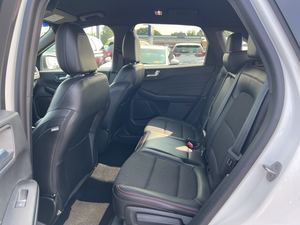 2023 Ford Escape ST-Line AWD blanc sièges en cuir d'occasion système de navigation démarrage à distance toit ouvrant Android Auto jantes en alliage gauche - Product Image 6