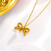 En gros Petit Tempérament Frais Noeud Papillon Perle Artificielle Boucles D'oreilles et Collier pour Femmes Bijoux De Mode Coréenne