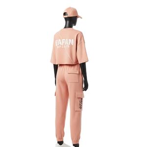 Conjunto deportivo de mujer de alta calidad en algodón y poliéster, top corto de 260 GSM y pantalón con cintura elástica color melocotón. Conjuntos para mujer. - Product Image 5