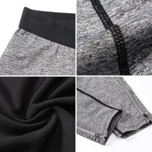 Pantalon réfléchissant pour la course nocturne, vêtements d'entraînement pour hommes avec poches zippées et design de compression à séchage rapide - Product Image 3