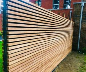 Postes de cerca de madera tratada a presión Selección de los materiales de cercado de madera adecuados - Product Image 2