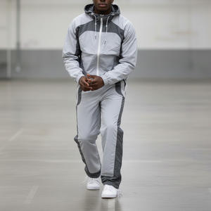 Chándal personalizado para hombre con chaqueta con capucha y pantalones jogger ajustados, suministro al por mayor de marca - Product Image 1