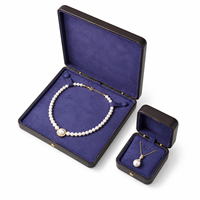 Boîte à bijoux en cuir PU marron arrondie personnalisée OEM avec doublure en velours doux pour bagues et colliers, emballage et présentation de marque pour cadeaux
