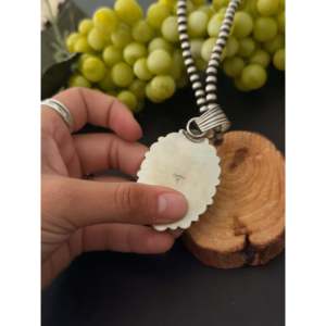Colgante de Plata de Ley Hecho a Mano por Artesanos Navajo con Incrustaciones de Piedras Múltiples, Destacando una Turquesa Engastada en Bisel como Piedra Principal - Product Image 5