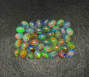 IGI certificado 19 Uds ópalo etíope cabujón ovalado suelto Natural Multi fuego tamaños 5*7mm a 20mm 10 CT lote para joyería - Product Image 3