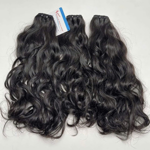 Artículos más vendidos Natural ondulado Natural negro máquina trama doble dibujado cabello vietnamita listo para enviar sin enredos precio al por mayor - Product Image 2