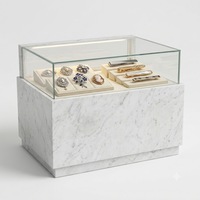Vitrine de présentation haut de gamme en acier inoxydable sur mesure pour salle d'exposition, magasin de détail, présentoir à bijoux