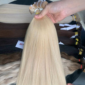 Vente en gros d'extensions de cheveux vietnamiens vierges 100% Tapr 60cm cheveux bruts super doublement étirés en couleur naturelle - Product Image 1