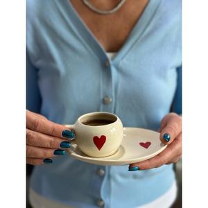 Cuore turco tazza di caffè con piattino