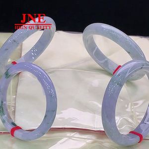 งานฝีมือที่ประณีตแหวนหยกธรรมชาติไม่แตกสีม่วงขายส่งจากโรงงาน - Product Image 4